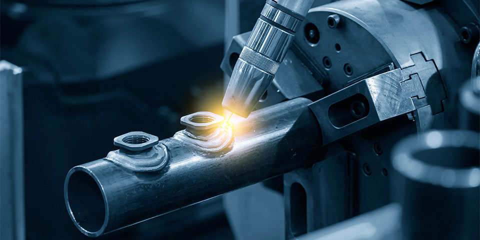 The abstract scene of robotic arm welding machine .